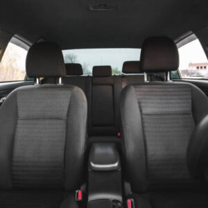 Car interior, part of front seats, close