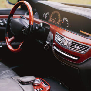 Luxury premium car interior with leather seats and modern technology.